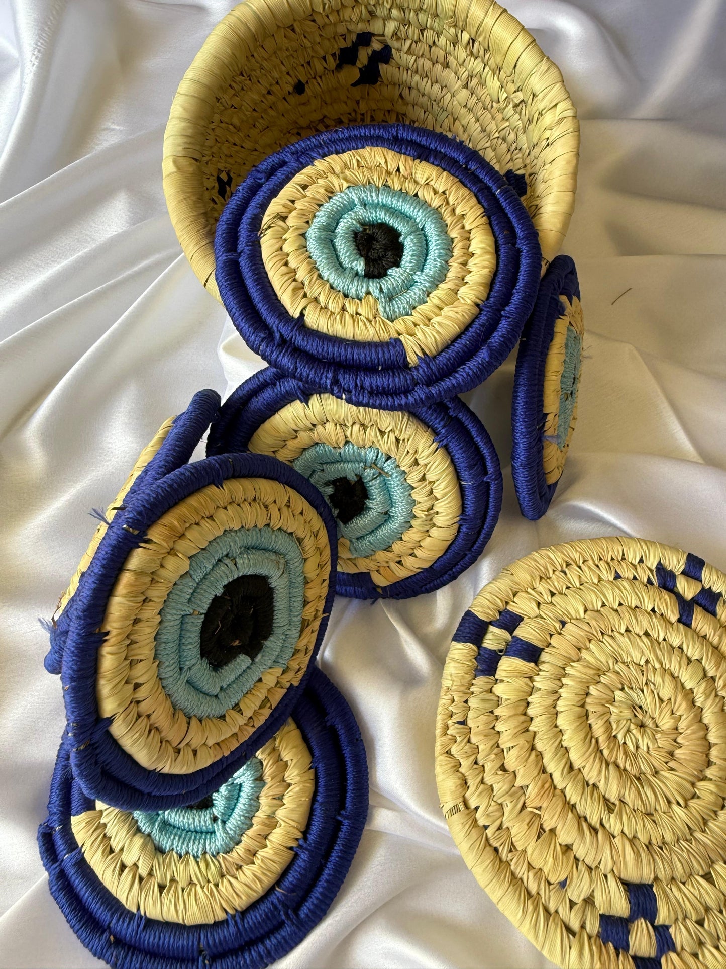 EVIL - EYE Handcrafted Jute Coasters With Sabai Grass Basket (SET OF 6 COASTERS + 1 BASKET)