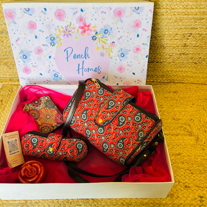 The Scarlet Bloom Hamper- Handblock Printed Red Sling with Matching Goggle Case, Wallet & Free Scented Candle