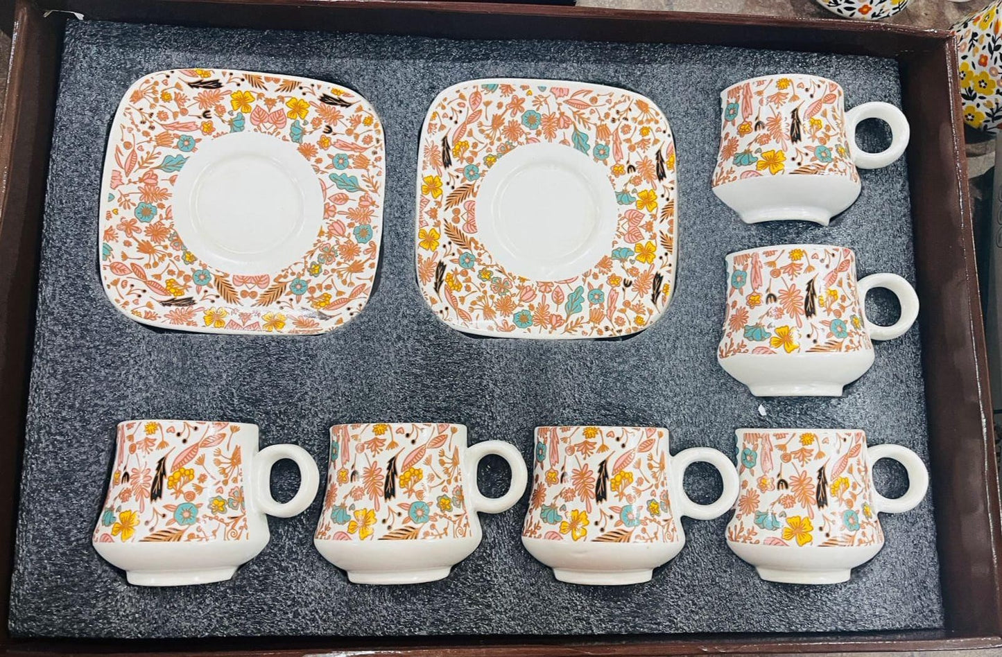 Orange Cup and Saucers