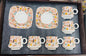 Orange Cup and Saucers